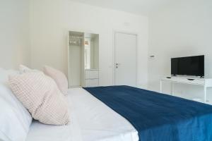 Postel nebo postele na pokoji v ubytování Marèe b&b
