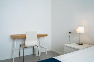Postel nebo postele na pokoji v ubytování Marèe b&b