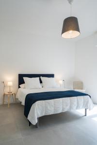Postel nebo postele na pokoji v ubytování Marèe b&b