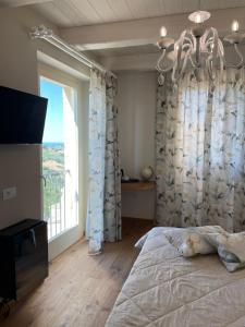 A bed or beds in a room at AFFITTACAMERE LA VOLPE