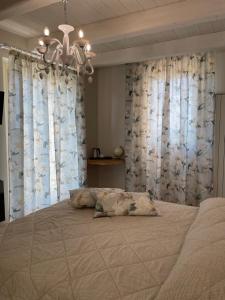 A bed or beds in a room at AFFITTACAMERE LA VOLPE