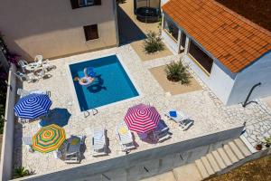 Bazén v ubytování Apartman Ana Marija nebo v jeho okolí