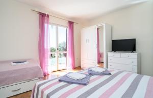 Postel nebo postele na pokoji v ubytování Apartman Ana Marija