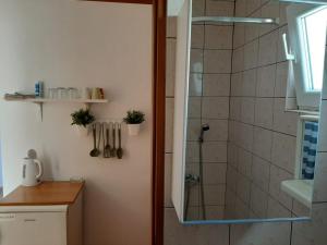 Ein Badezimmer in der Unterkunft Apartments Burcul Pag