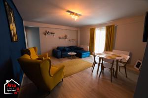 Posezení v ubytování Arca Sweet Apartment Ariniș