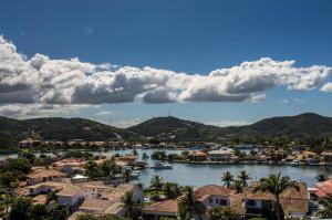 a view of a town on a river with houses at Flat 402 in Cabo Frio 700m from the beach in Cabo Frio