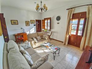 Posezení v ubytování El Rancho Grande - Apartamento
