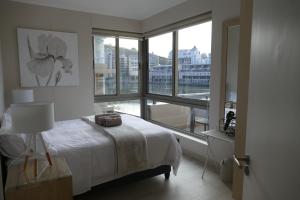 Ένα ή περισσότερα κρεβάτια σε δωμάτιο στο Little Venice Self Catering +40 φωτογραφίες