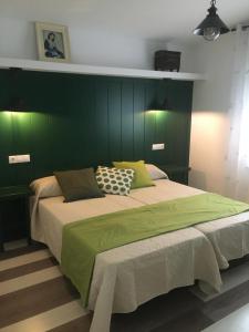 A bed or beds in a room at Casa rural La Quinta De Lara