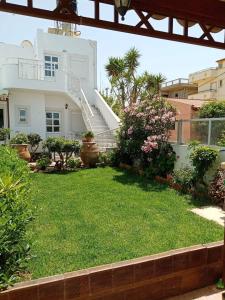 A garden outside Marina Villa