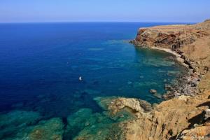 an aerial view of the ocean next to a cliff at Agriturismo Hibiscus in Ustica