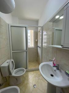 Koupelna v ubytování Nimfeum Apartments + 28 fotografií