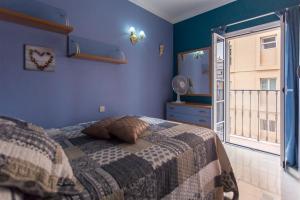 A bed or beds in a room at Piso de 2 habitaciones en Mesa y López