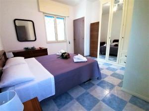 Postel nebo postele na pokoji v ubytování Maresalento Villetta Dante