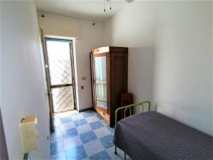 Postel nebo postele na pokoji v ubytování Maresalento Villetta Dante