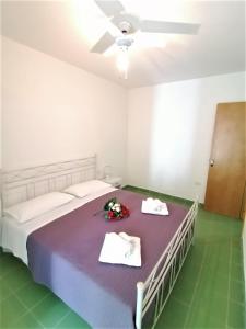 Postel nebo postele na pokoji v ubytování Maresalento Villetta Dante