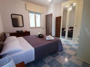 Postel nebo postele na pokoji v ubytování Maresalento Villetta Dante