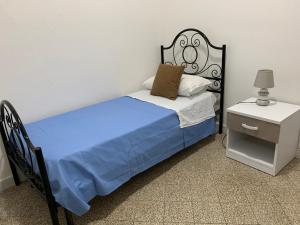 Кровать или кровати в номере Casa Mercede