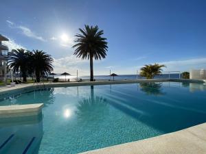 Bazén v ubytování Acapulco Playa 412 Apartments Casasol nebo v jeho okolí