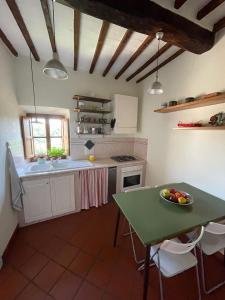 Kuchyňa alebo kuchynka v ubytovaní Casa vicolo dell’assedio