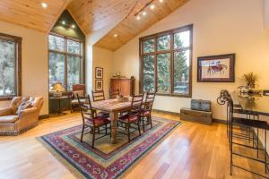 a dining room with a table and chairs at Mission Rock 1 in Ouray