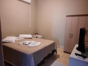 
Cama ou camas em um quarto em Flat Beira Rio
