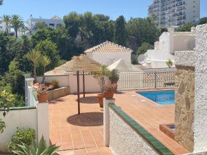 Výhled na bazén z ubytování Mediterraneo bajo Casasol nebo okolí
