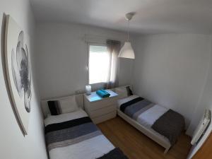 Posteľ alebo postele v izbe v ubytovaní Casa San Tomas