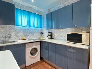 Kuchyňa alebo kuchynka v ubytovaní Acapulco 16 Apartments Casasol
