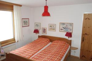 Postel nebo postele na pokoji v ubytování Hoch über dem Rheintal