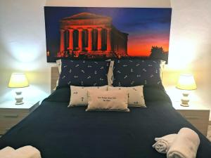 Giường trong phòng chung tại Casa Vacanze Marco Polo