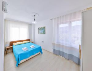 Кровать или кровати в номере Villa Candan Kaş