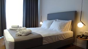 Postel nebo postele na pokoji v ubytování Valmar Hotel