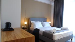 Postel nebo postele na pokoji v ubytování Valmar Hotel