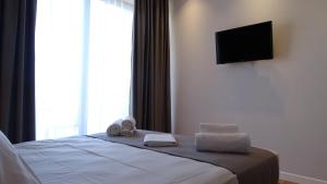 Postel nebo postele na pokoji v ubytování Valmar Hotel