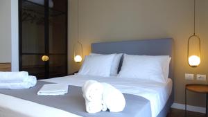 Postel nebo postele na pokoji v ubytování Valmar Hotel