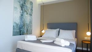 Postel nebo postele na pokoji v ubytování Valmar Hotel