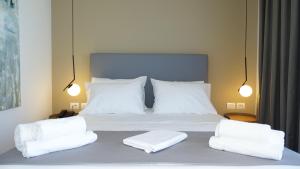 Postel nebo postele na pokoji v ubytování Valmar Hotel