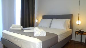 Postel nebo postele na pokoji v ubytování Valmar Hotel