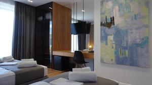 Postel nebo postele na pokoji v ubytování Valmar Hotel + 37 fotografií