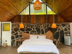 Postel nebo postele na pokoji v ubytování Rancho Ecoturistico el Faro