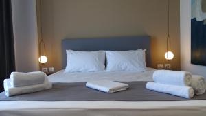 Postel nebo postele na pokoji v ubytování Valmar Hotel