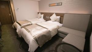 Postel nebo postele na pokoji v ubytování Koriyama View Hotel Annex