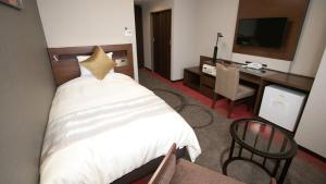 Postel nebo postele na pokoji v ubytování Koriyama View Hotel Annex