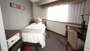 Postel nebo postele na pokoji v ubytování Koriyama View Hotel Annex