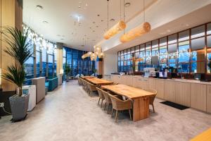 Restoranas ar kita vieta pavalgyti apgyvendinimo įstaigoje DarakHyu Yeosu Capsule Hotel by WALKERHILL