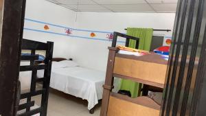 Voodi või voodid majutusasutuse Palomino Hostel toas