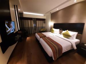 TV/trung tâm giải trí tại HYCINTH Hotels