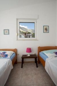 Posteľ alebo postele v izbe v ubytovaní Apartment in Duce with sea view, balcony, air conditioning, Wi-Fi (132-3)