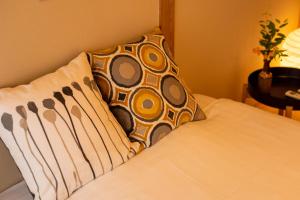 Postel nebo postele na pokoji v ubytování 寅ホテル 台東 Hotel 寅 台东 Tora Hotel Taito D